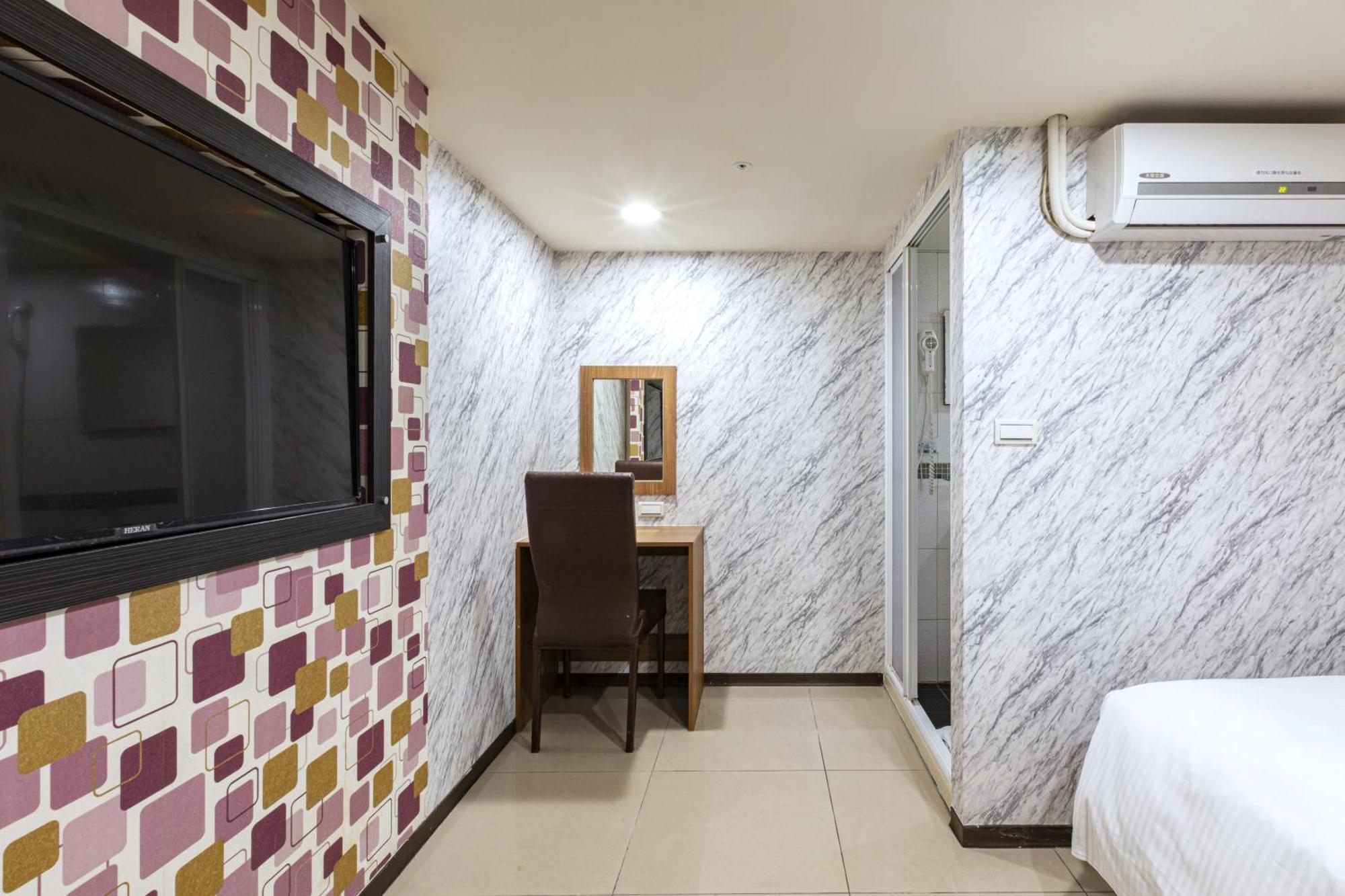 E Lim Hotel Zhongli Zimmer foto