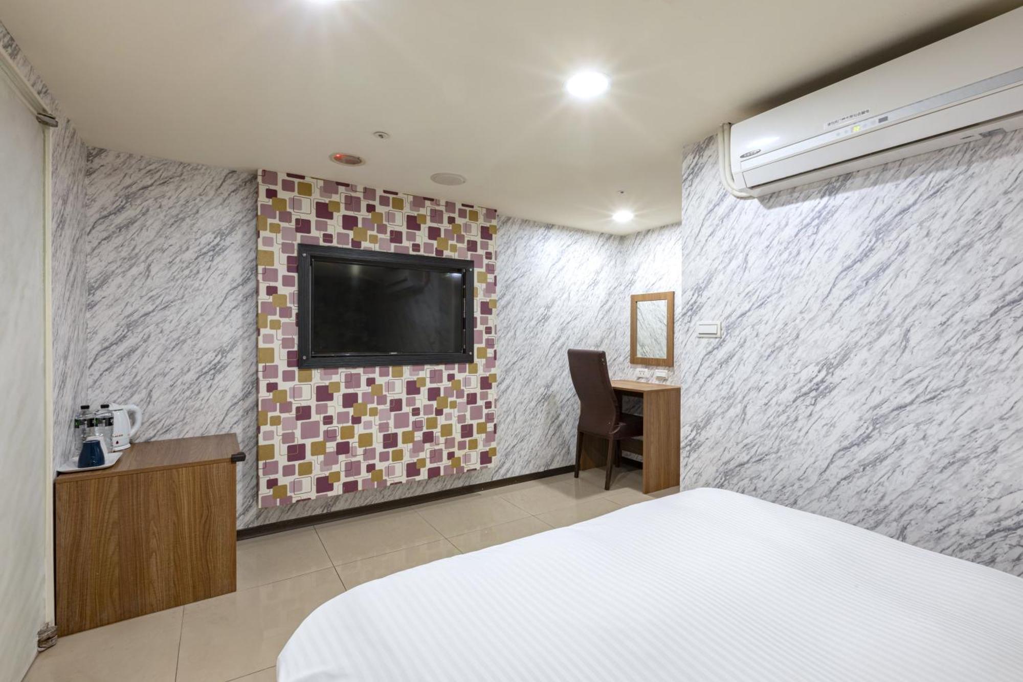 E Lim Hotel Zhongli Zimmer foto
