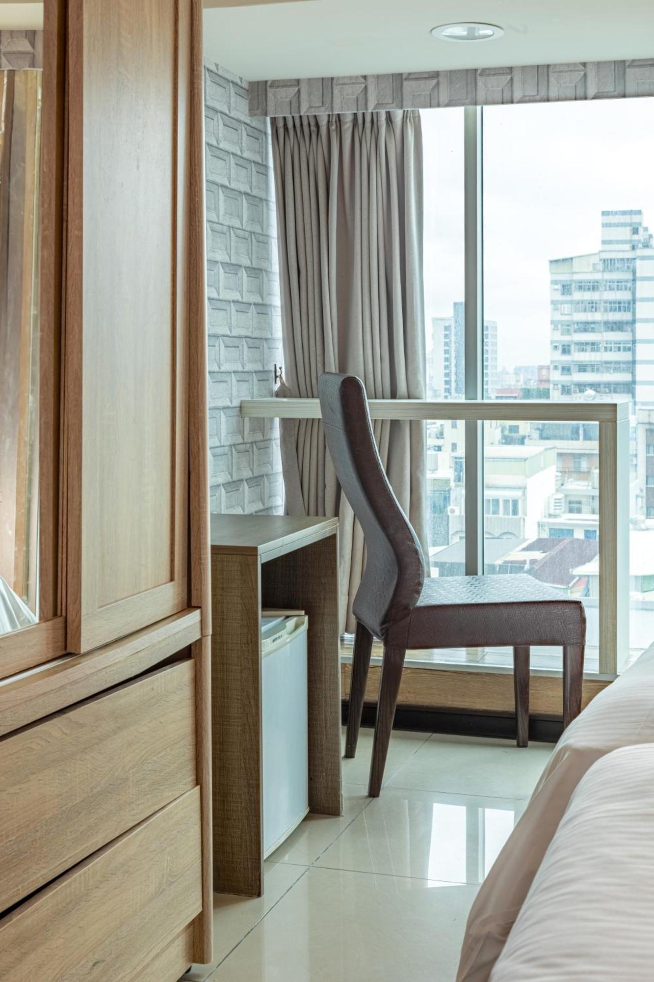 E Lim Hotel Zhongli Zimmer foto