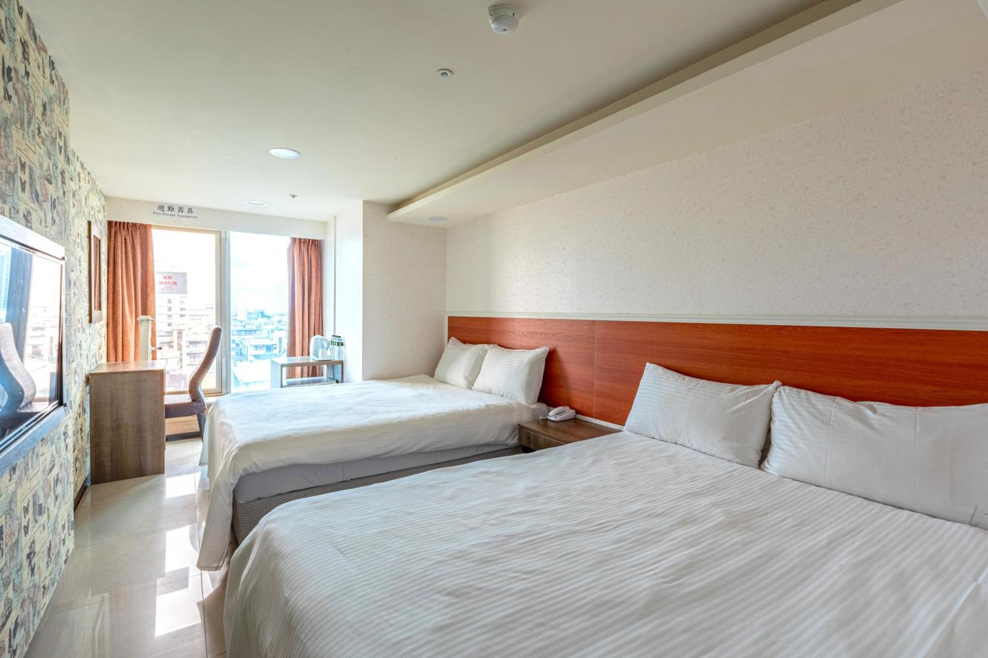 E Lim Hotel Zhongli Zimmer foto