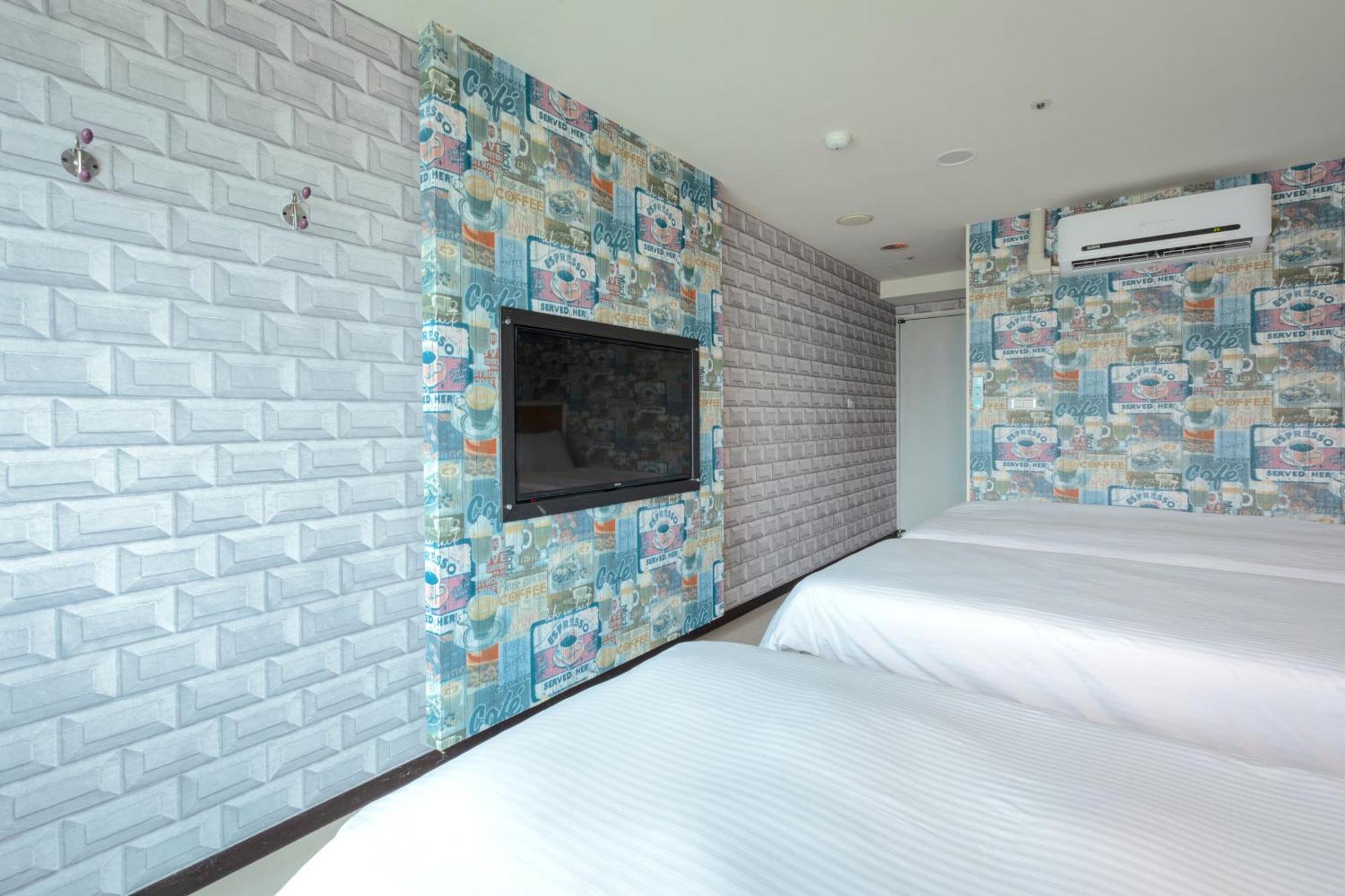 E Lim Hotel Zhongli Zimmer foto